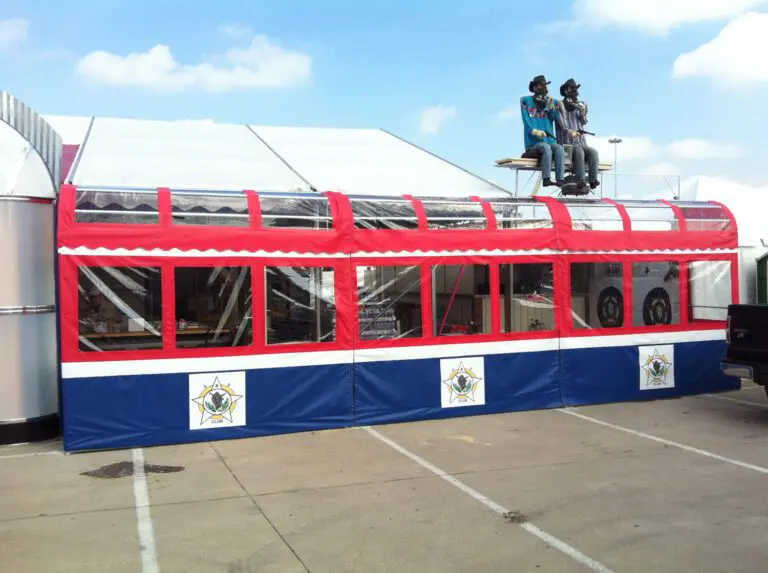 Clear-windowed red and blue event canopy