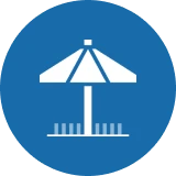 Beach umbrella icon on blue circular background.